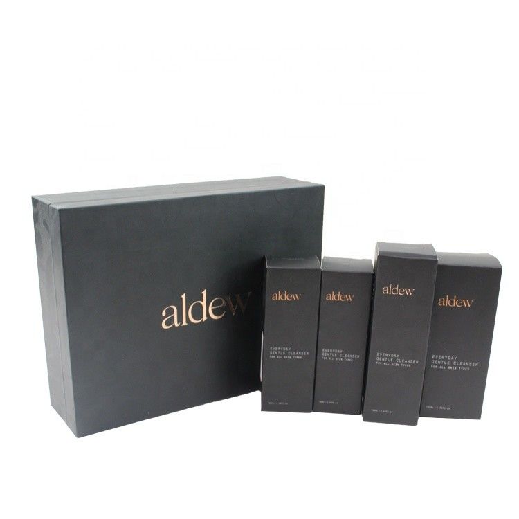 Cajas de regalo cosméticos con tapa magnética negra para conjuntos de productos de cuidado de la piel de lujo Embalaje