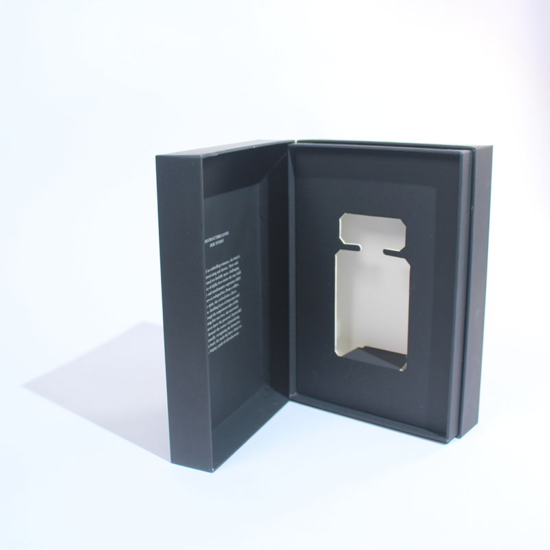 Diseño de embalaje de cajas de perfumes en blanco y negro con cierre magnético para pequeñas empresas