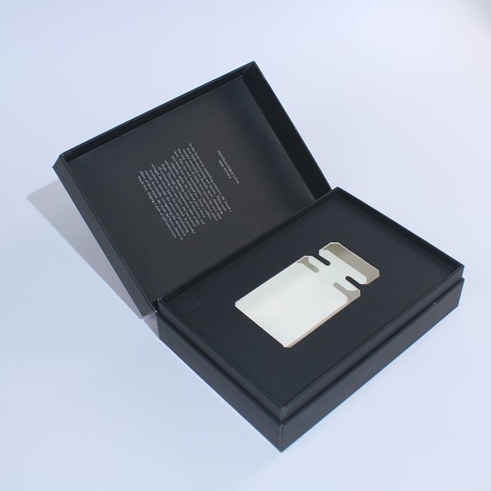 Caja de regalo de perfume blanco y negro Cajas de embalaje pequeñas adecuadas para el cuidado de la piel con logotipo personalizado