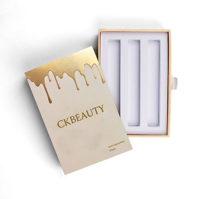 Cajas cosméticas en relieve de oro personalizadas Cajas de papel de lápiz labial personalizadas para venta al por menor